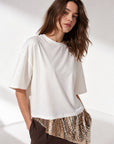 Top crème à sequins coupe ample