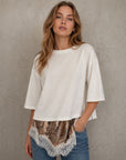 Top crème manches 1 2 sequins et dentelle