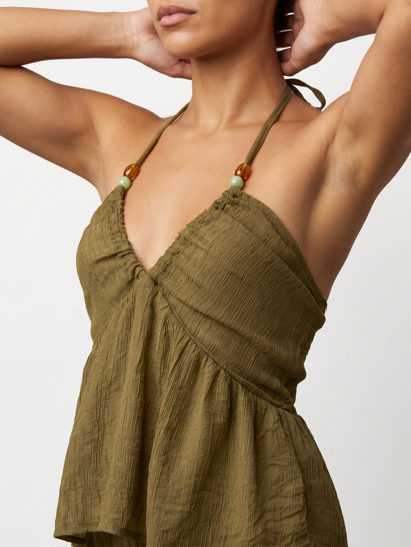 top péplum texturé vert olive