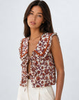 top gilet fleuri a liens col volante image 1