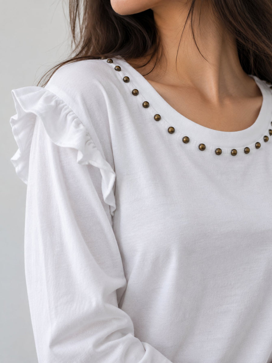 Détail col clouté bronze blanc