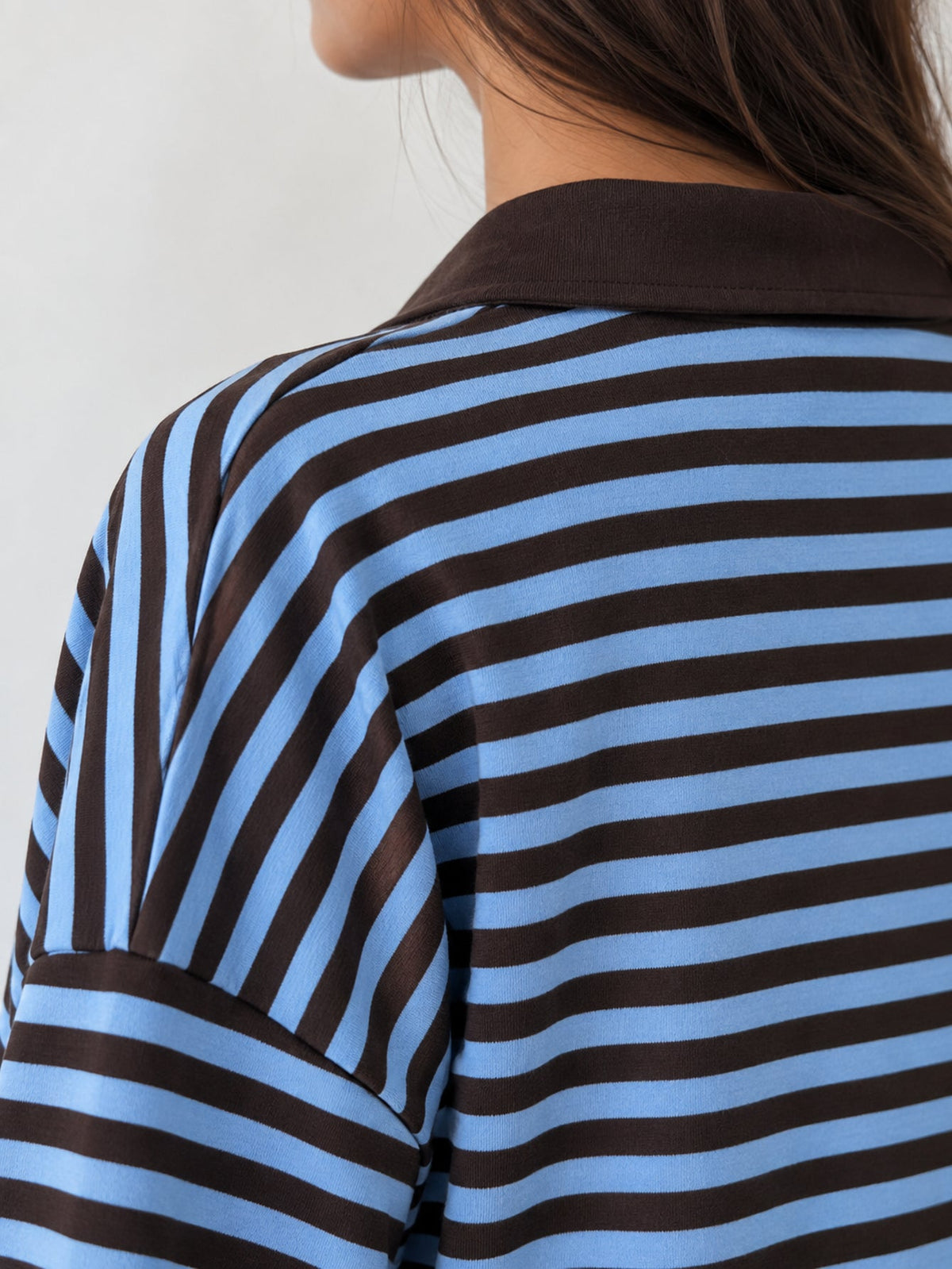 Patte boutonnée contrastée du polo
