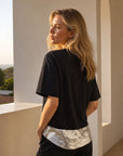 Top T shirt noir à sequins