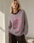 Top T shirt rayé manches longues « Believe »