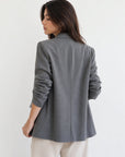 veste rayée grise dos