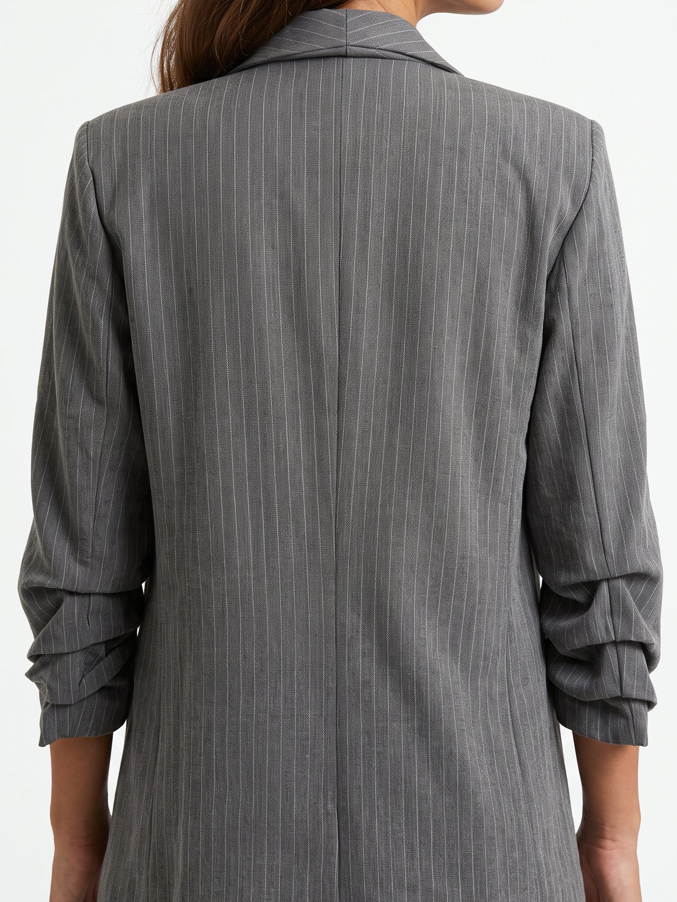 veste grise dos détail rayures