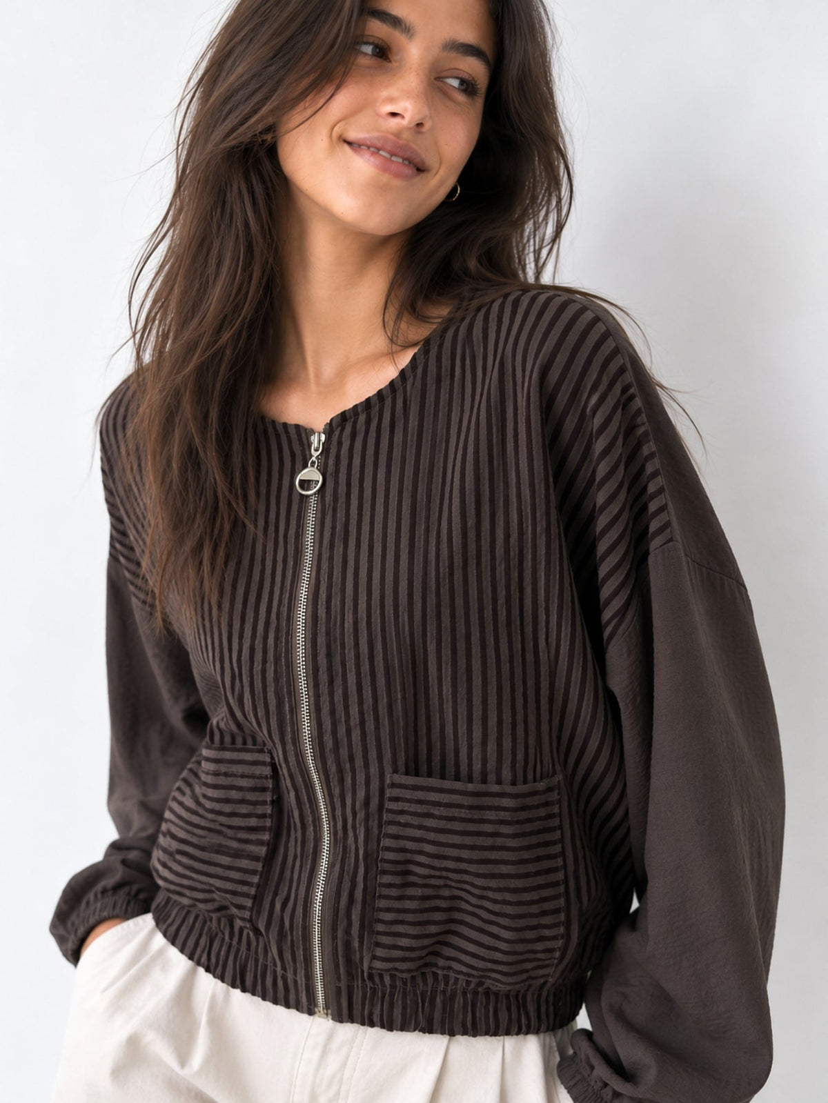 Détail du zip à anneau du blouson