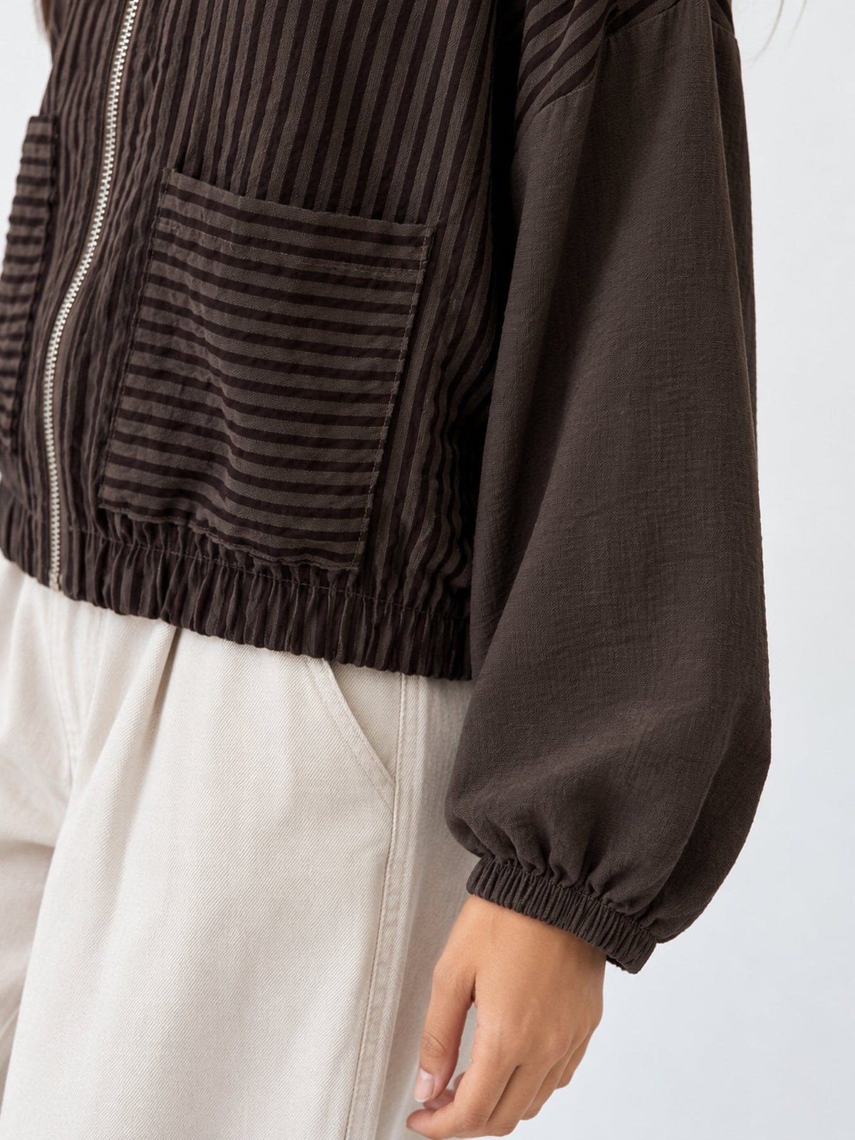 Ourlet élastiqué du blouson