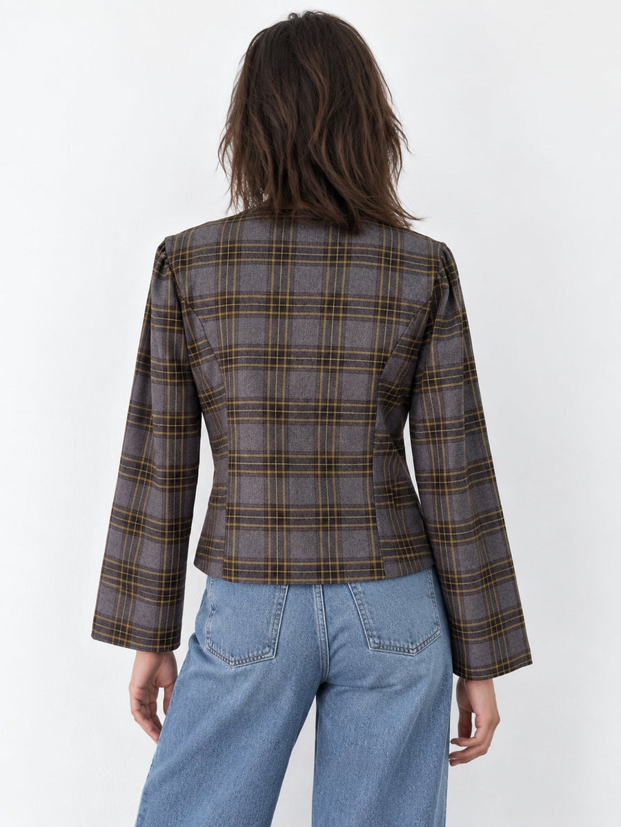Dos de la veste à carreaux coupe cintrée