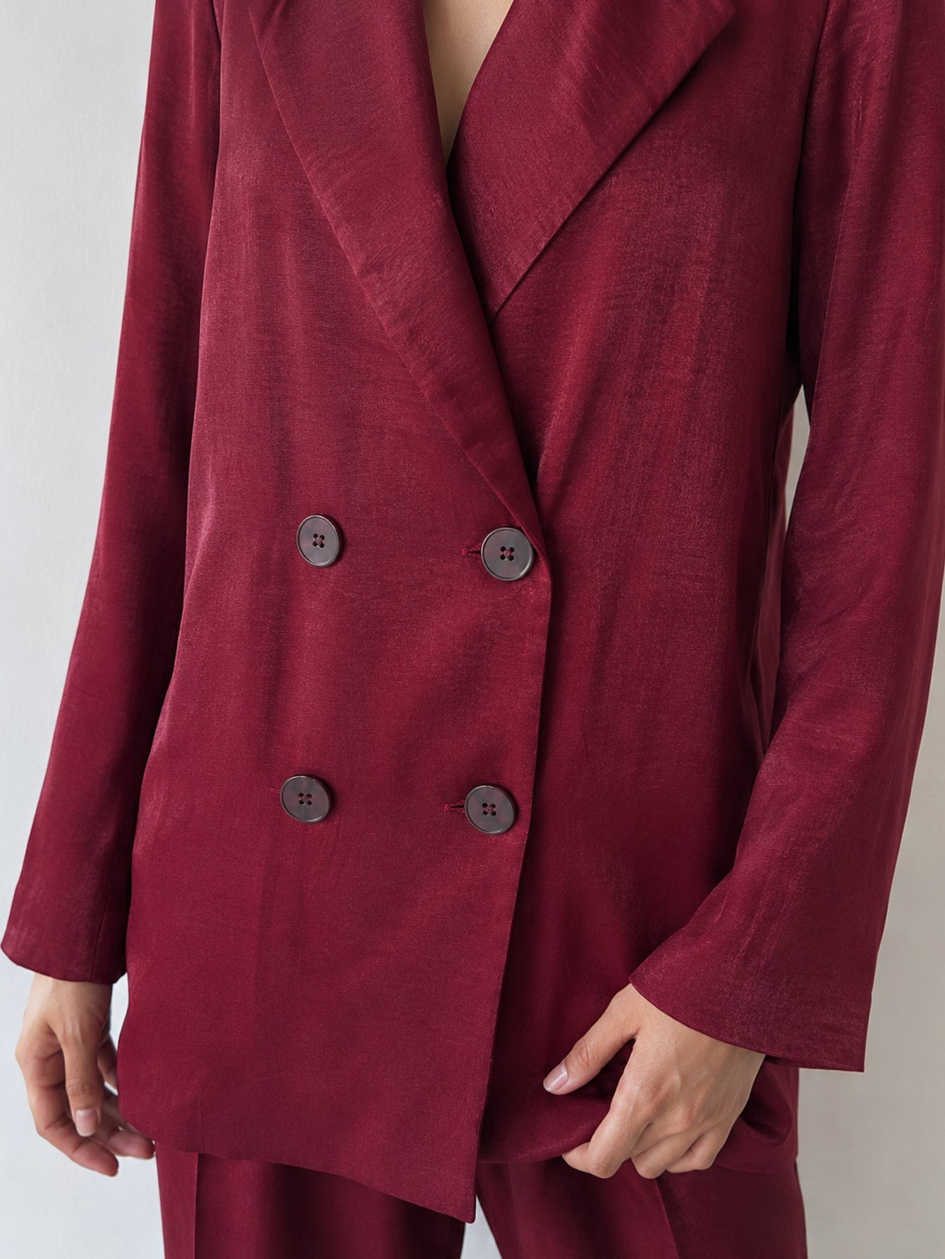 Veste bordeaux détail des boutons
