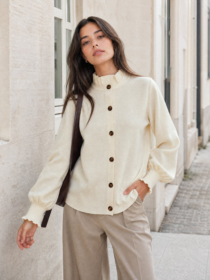 Gilet en maille beige col volanté