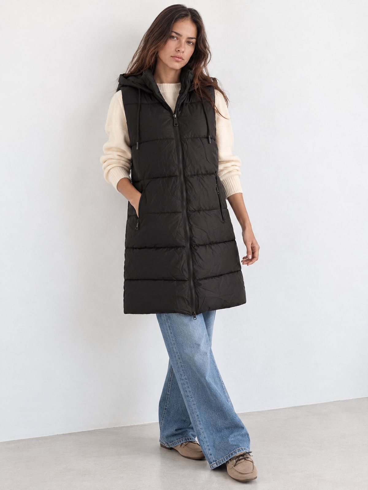 Gilet matelassé long noir à capuche
