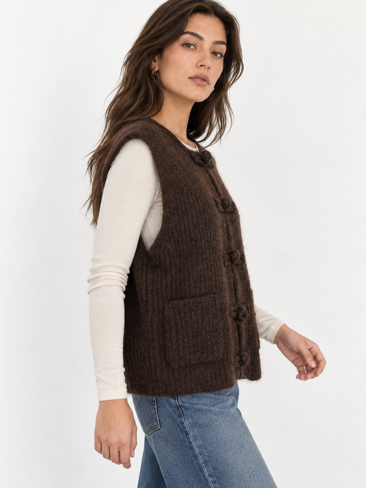 Profil du gilet marron sans manches