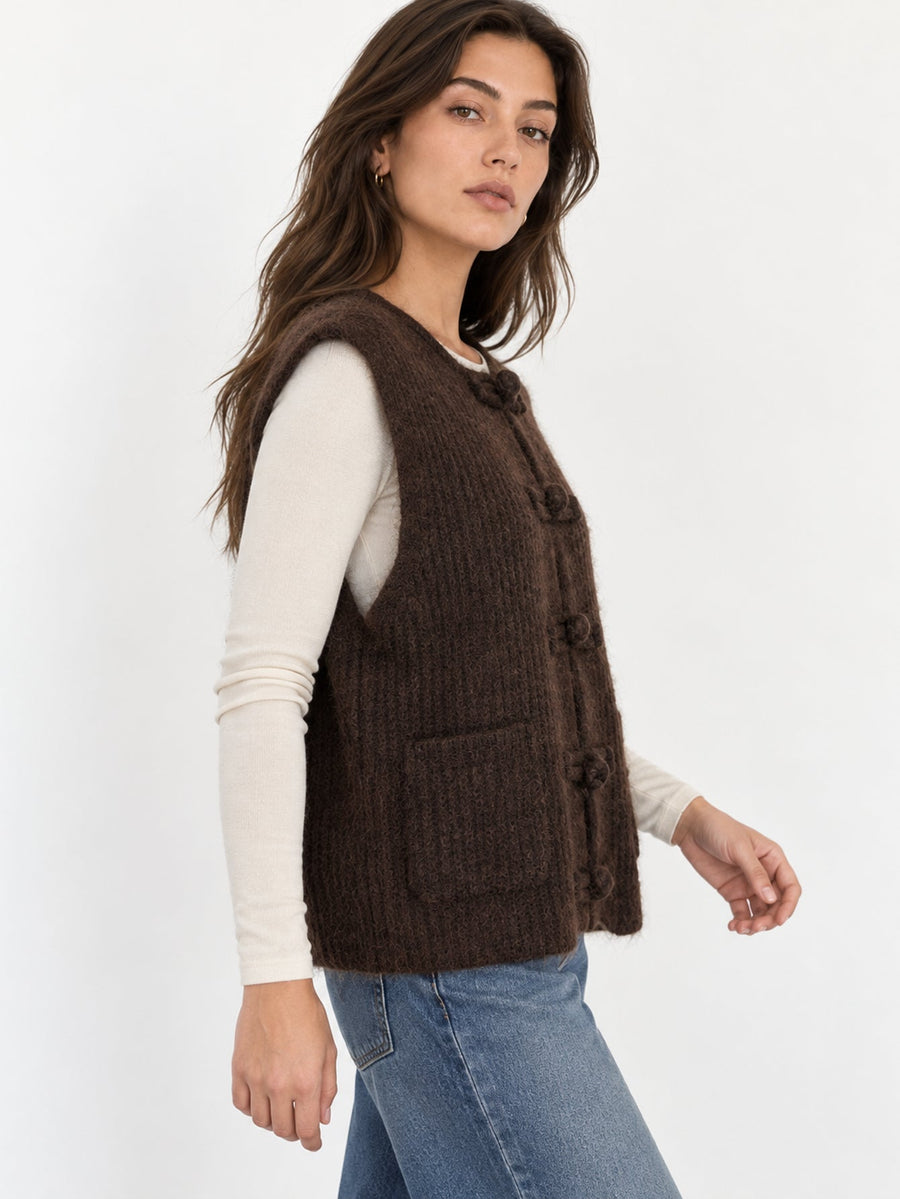 Profil du gilet marron sans manches